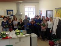 People standing in kitchen at Food for Thought Veg Varsity event