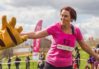 high fiving runntu runner