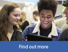 Students looking at a tablet