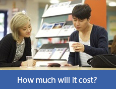 Two people lookin at a brochure