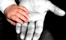 Childs and adults hand