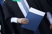 Student holding degree certifcate