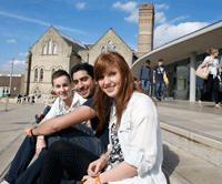 Students outside the Student Services Centre located in the Newton building on City Campus